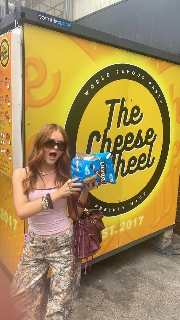 Consumer holding a bag of Doritos Cool Original during a street sampling activation in London